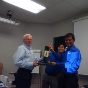 Bill Gibson Receives Sales Award from Hiro Suzuki
