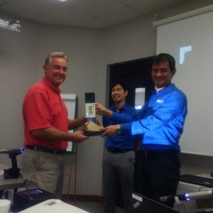 Rick McDonlad Receives Sales Award from Hiro Suzuki